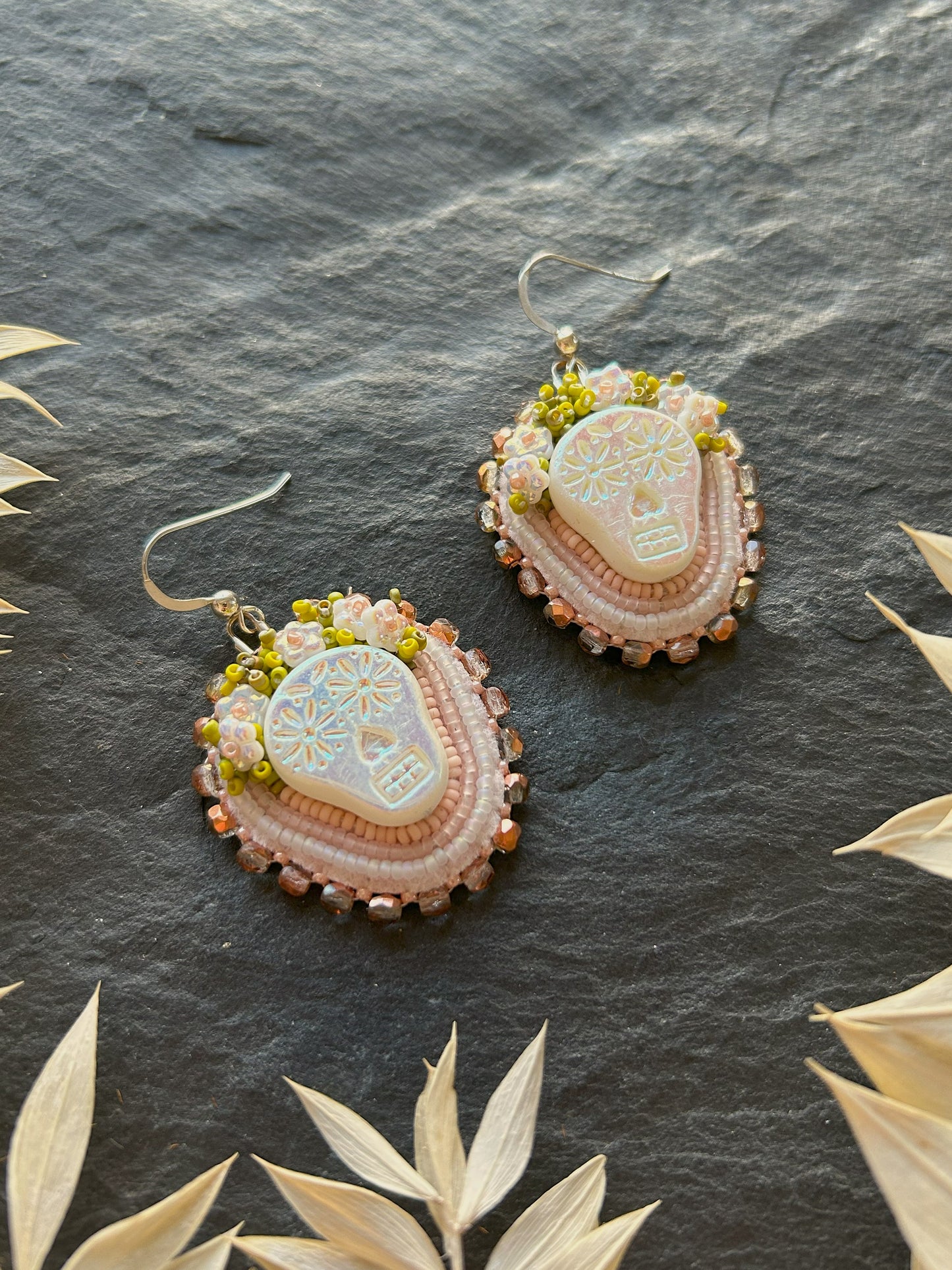 Earrings "Tuwile" with skulls wearing a flower crown - white & pastel shades