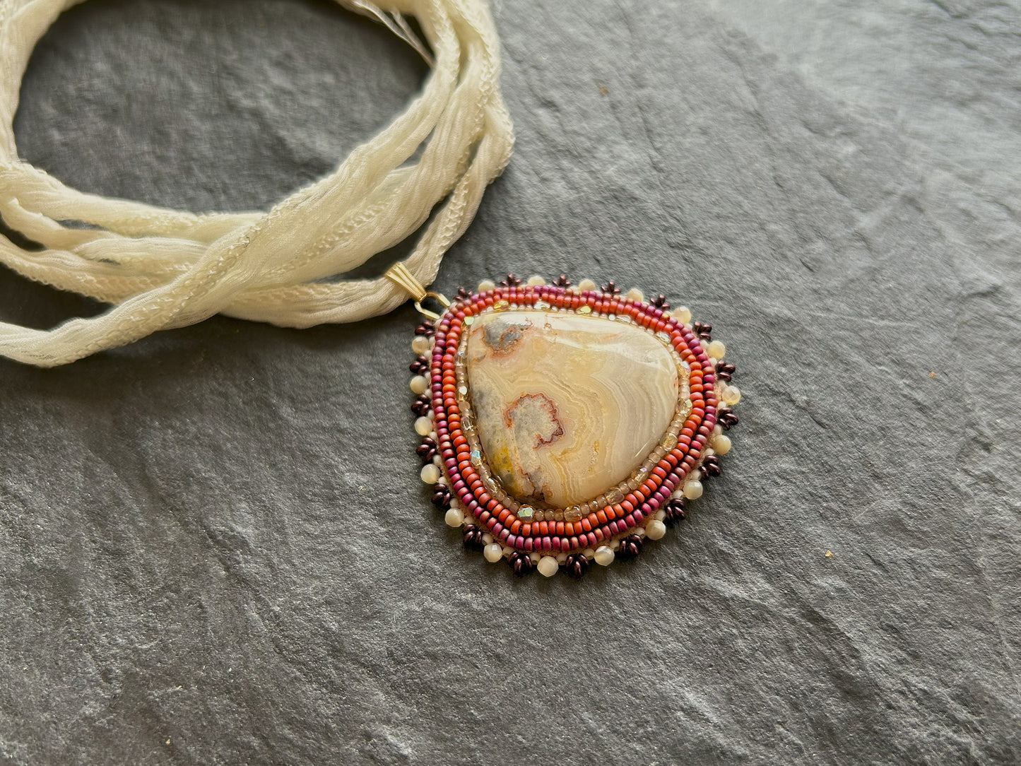 Agate necklace pendant with mother-of-pearl beads