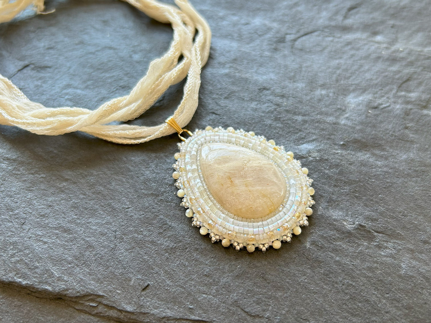 Moonstone necklace pendant with mother of pearl beads