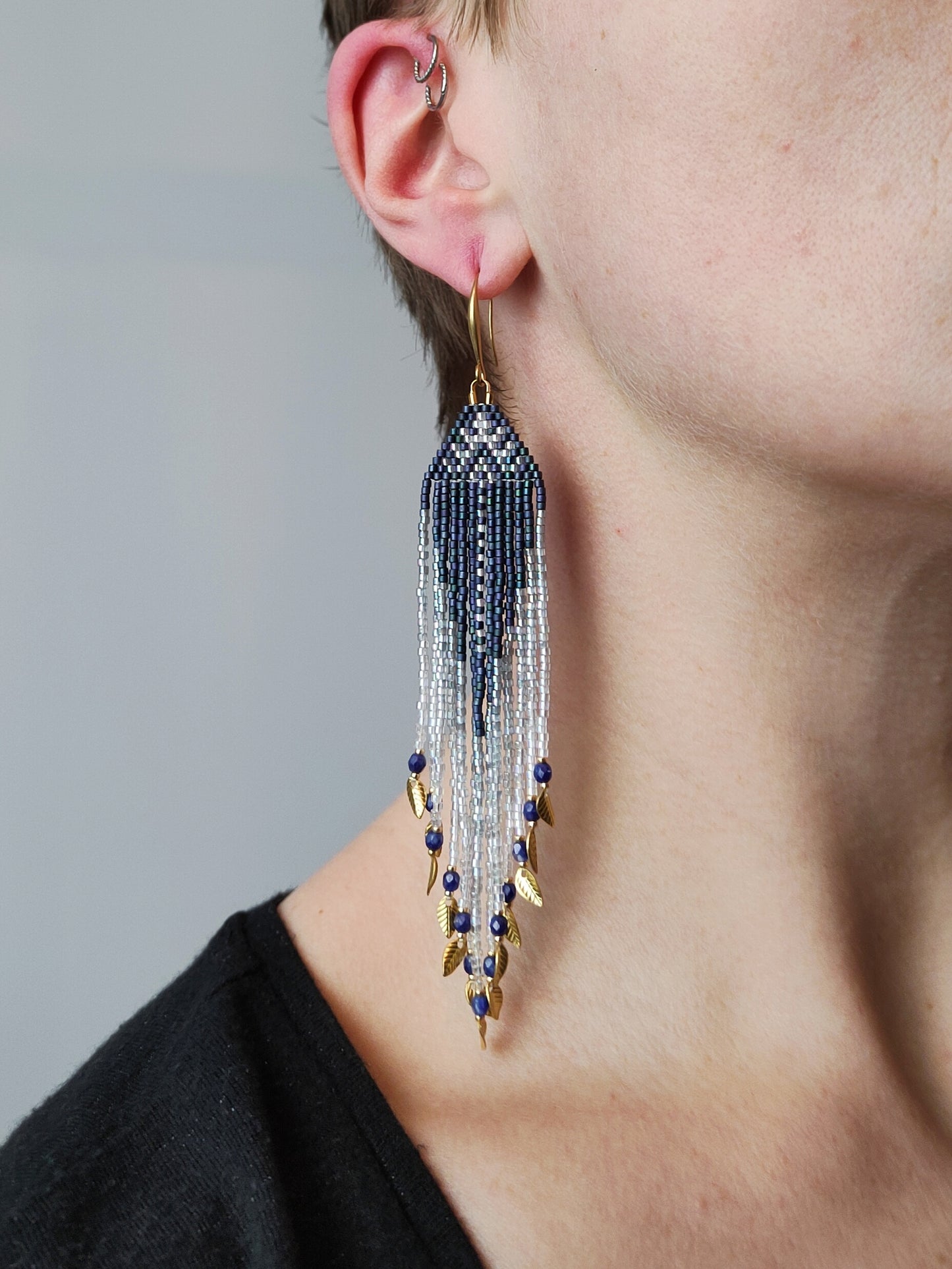 Fringe earrings "Faunus" with tribal-inspired design - denim blue