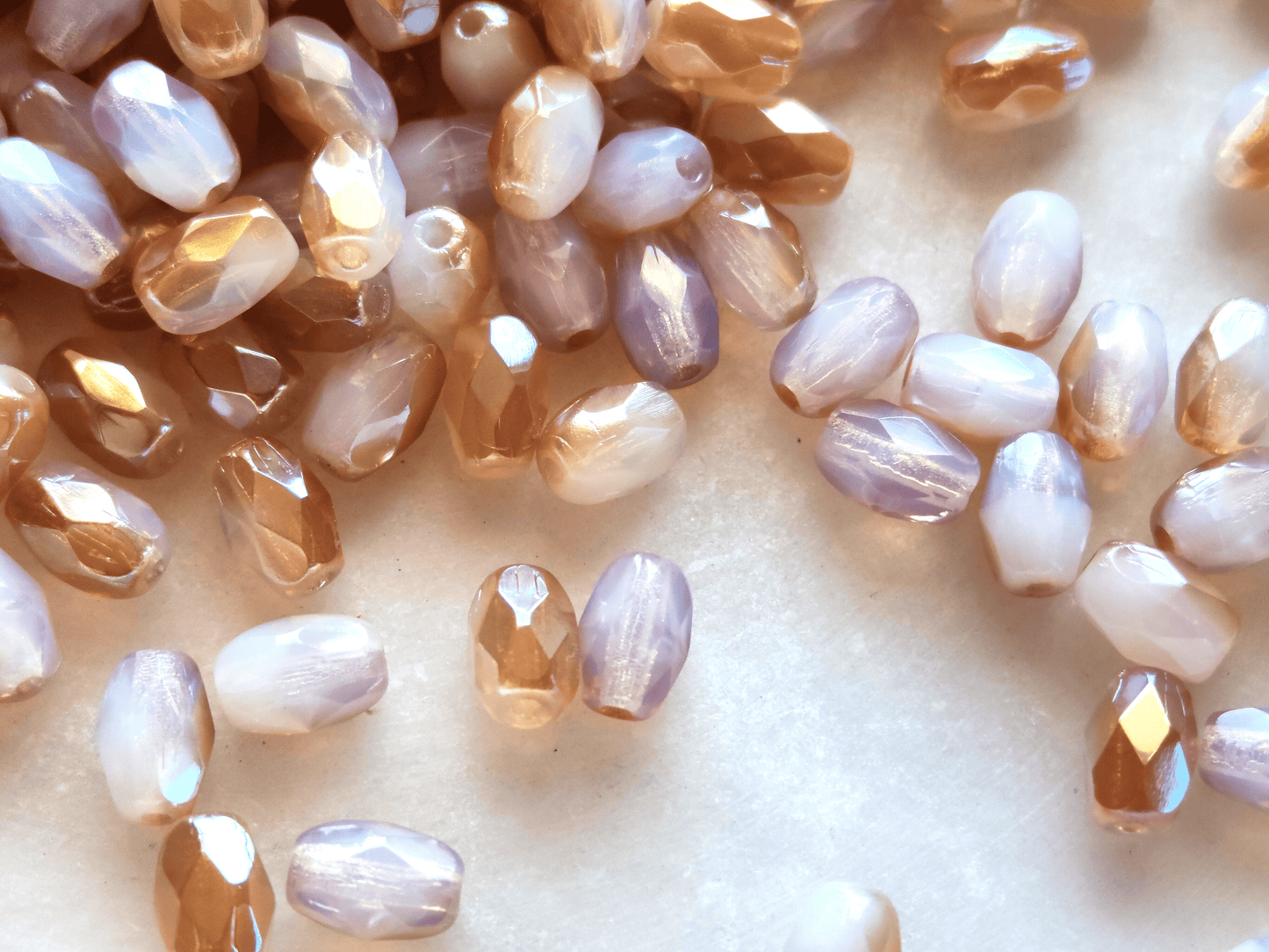 Faceted olive beads 4x6mm - white & brown