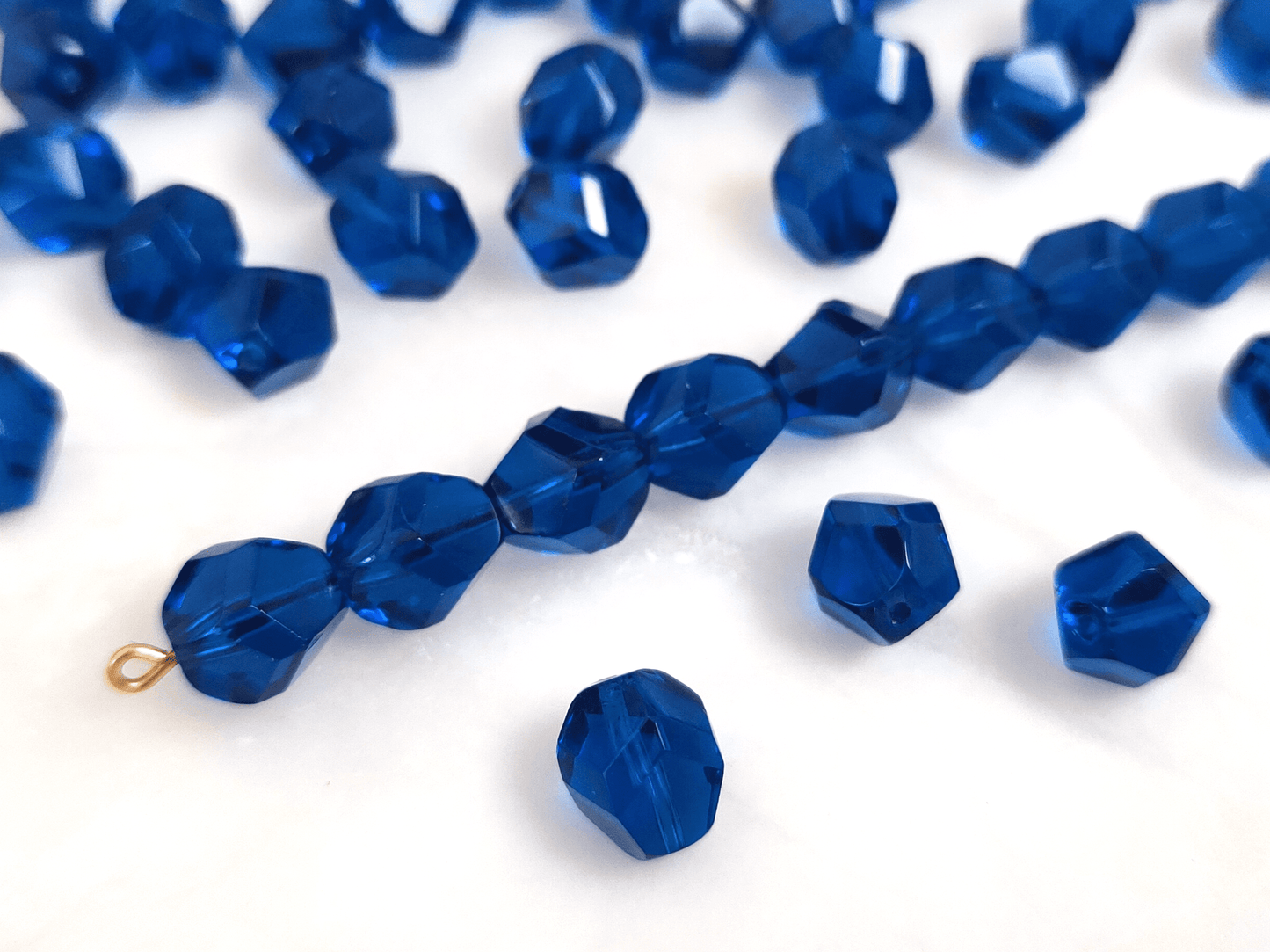 Faceted nugget beads 10x9mm - dark Caribbean blue