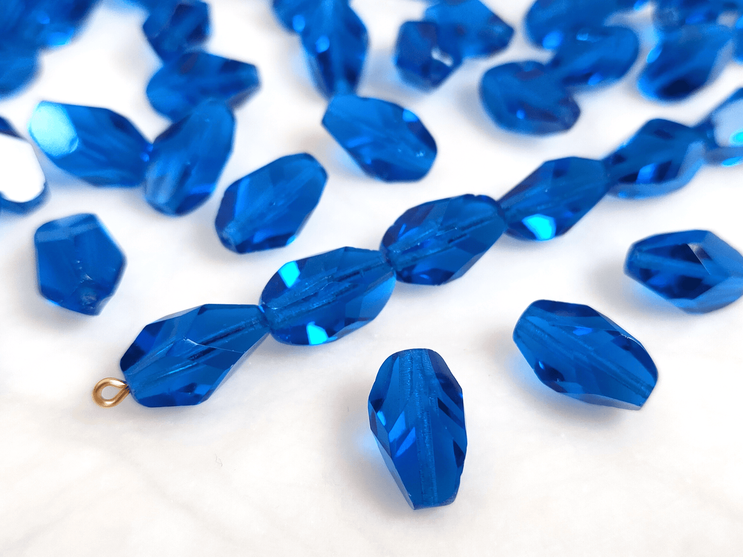 Faceted nugget beads 15x10mm - dark Caribbean blue