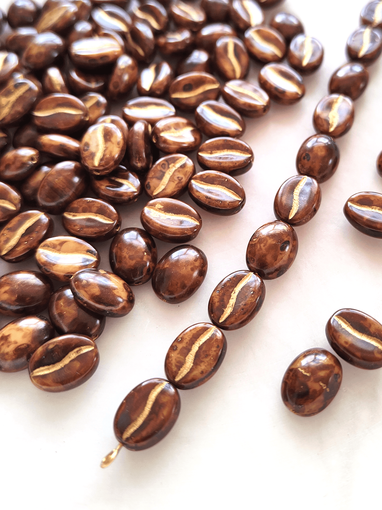 Coffee bean beads 11x8mm - brown & gold