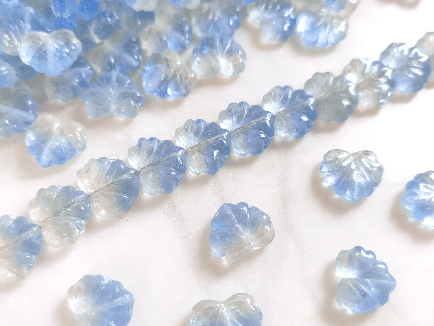 Vine leaf beads 13mm - colorless & ice blue