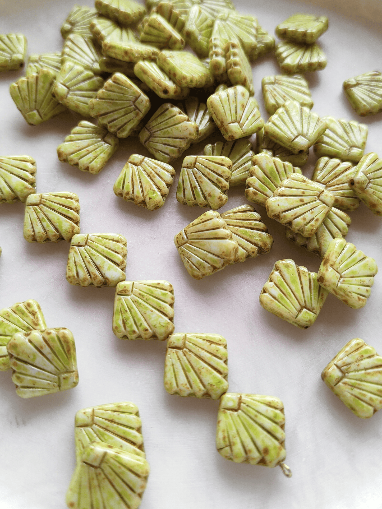 Fan ornament beads 17mm - light green & brown speckled