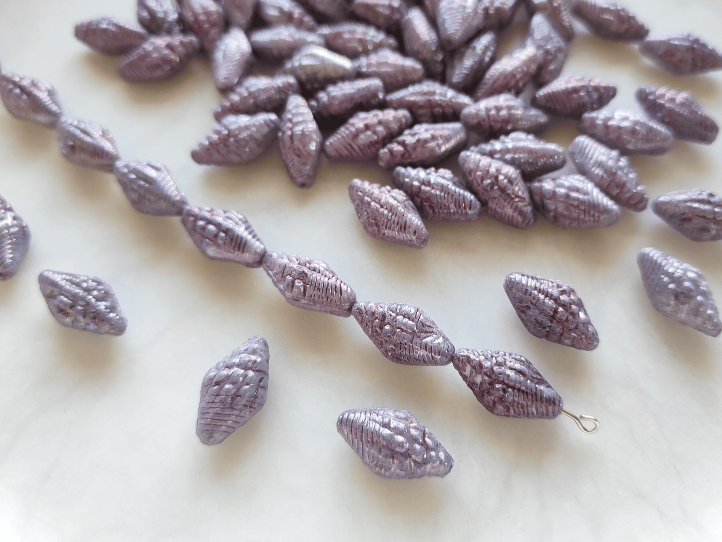 Miter shell beads 16x8mm - dusty purple