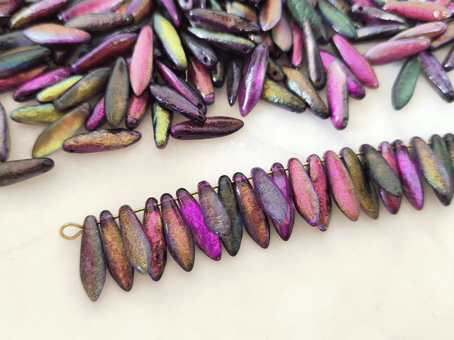 Dolche 5x16mm - dunkler Regenbogen geätzt