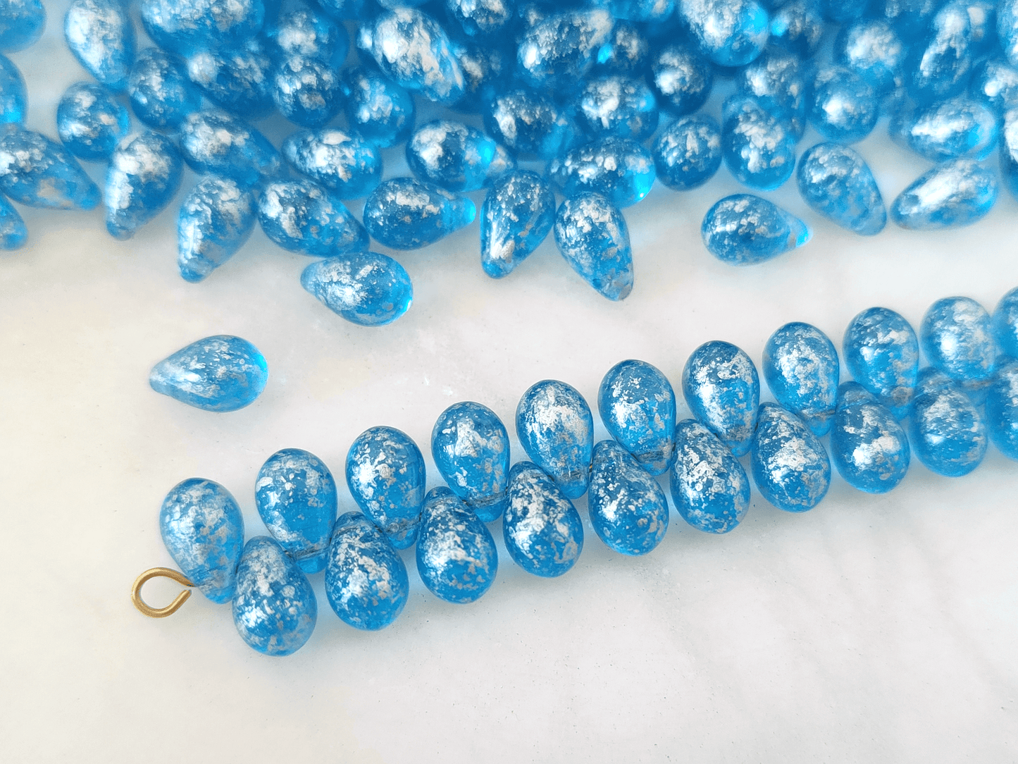 Tropfen 6x9mm - Blau & Silber gefleckt