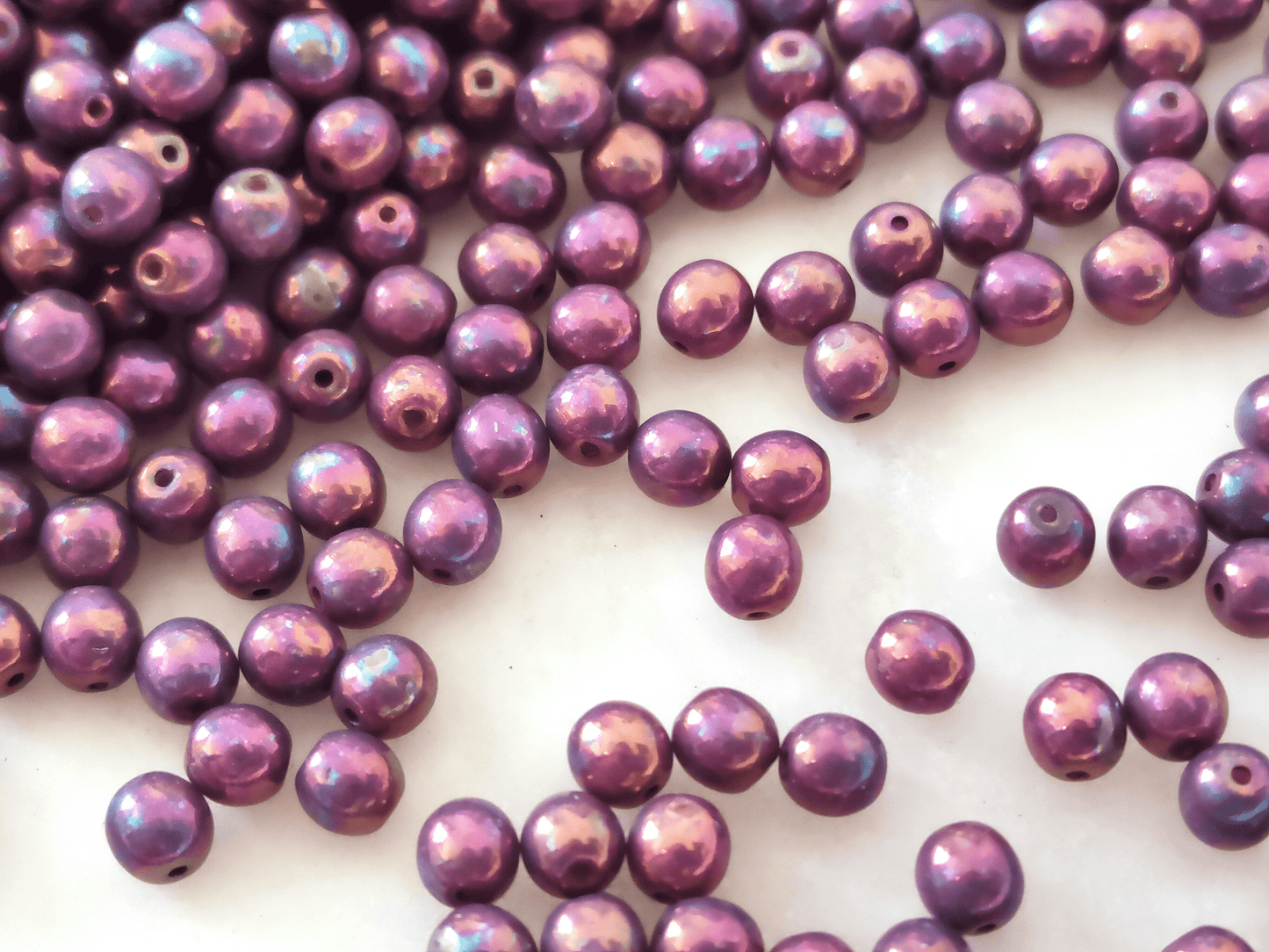 4mm round beads - purple gold luster