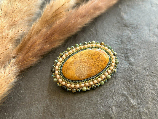 Fossil coral brooch with African turquoise