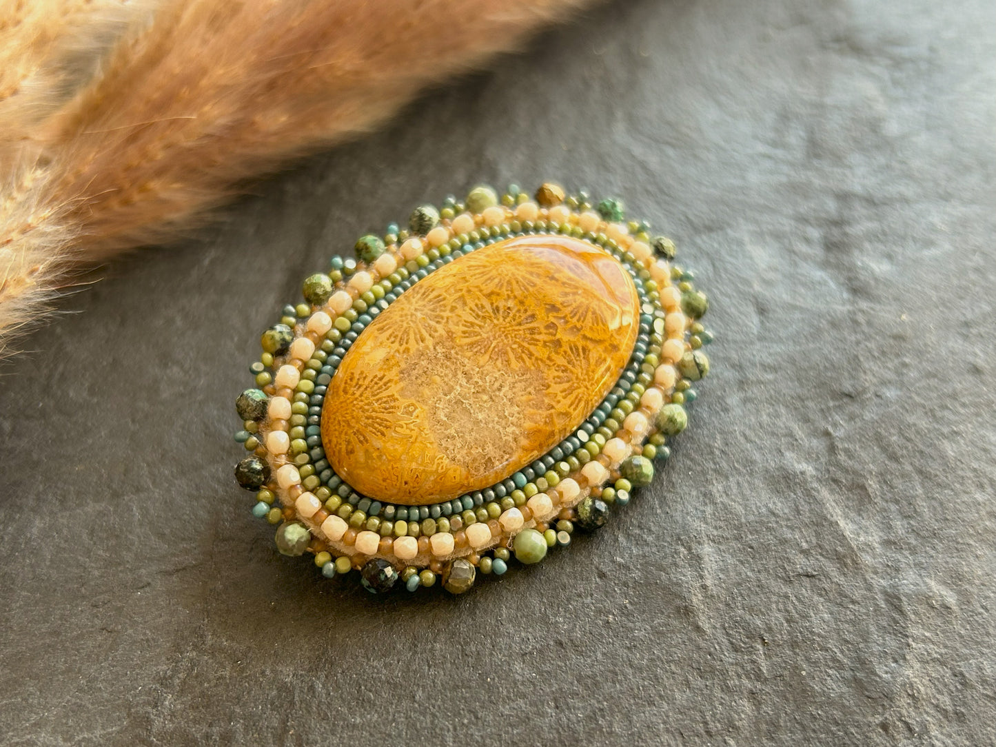 Fossil coral brooch with African turquoise