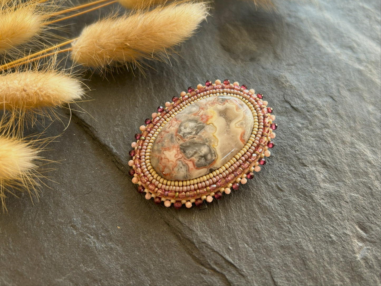 Agate brooch with rhodochrosite and garnet