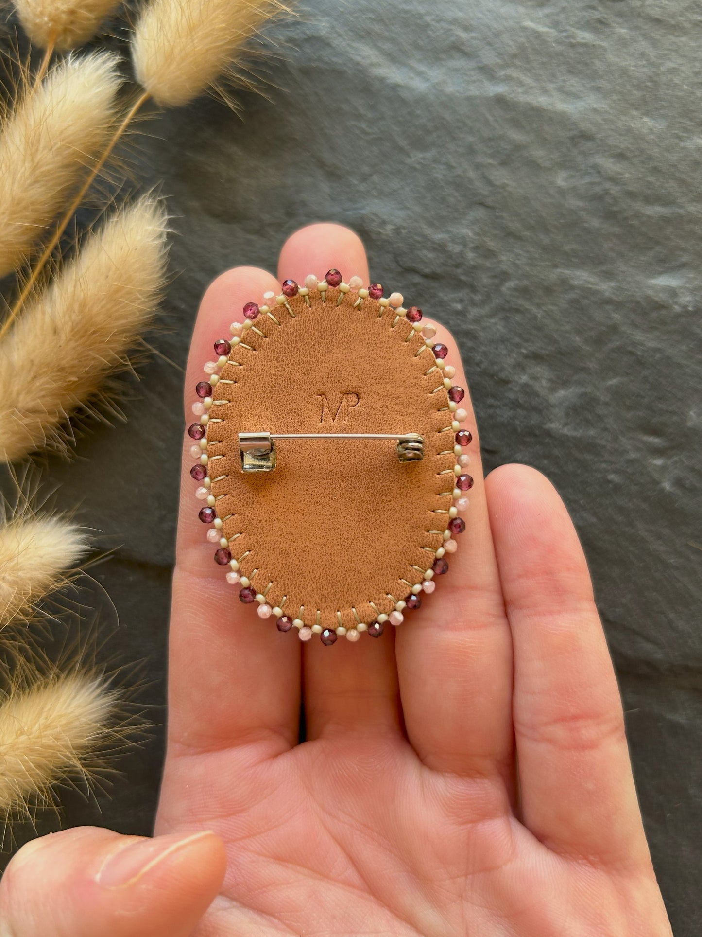 Agate brooch with rhodochrosite and garnet