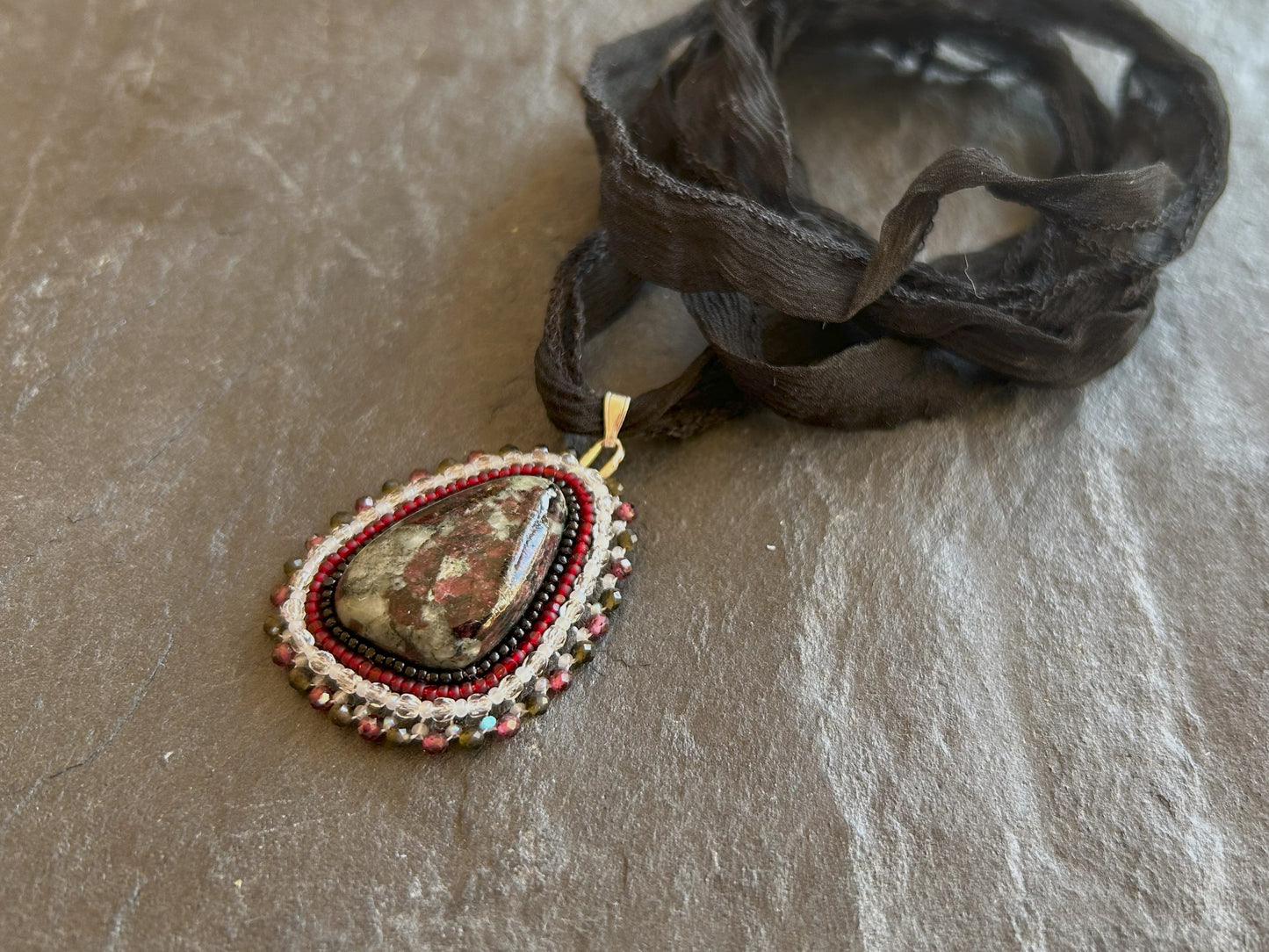 Eudialyte necklace pendant with garnet and obsidian beads