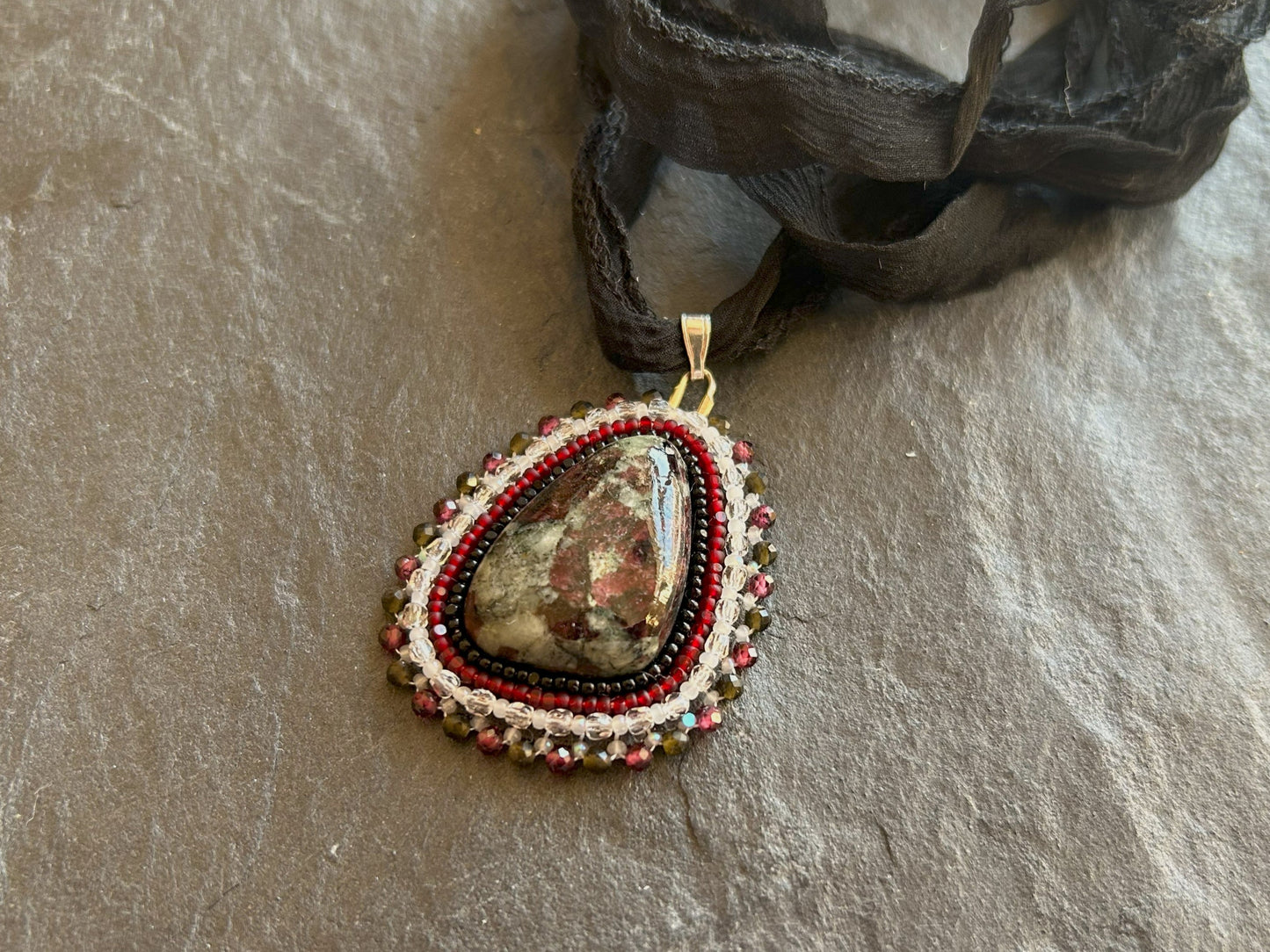 Eudialyte necklace pendant with garnet and obsidian beads