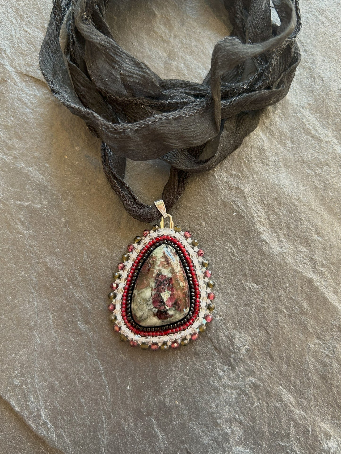 Eudialyte necklace pendant with garnet and obsidian beads