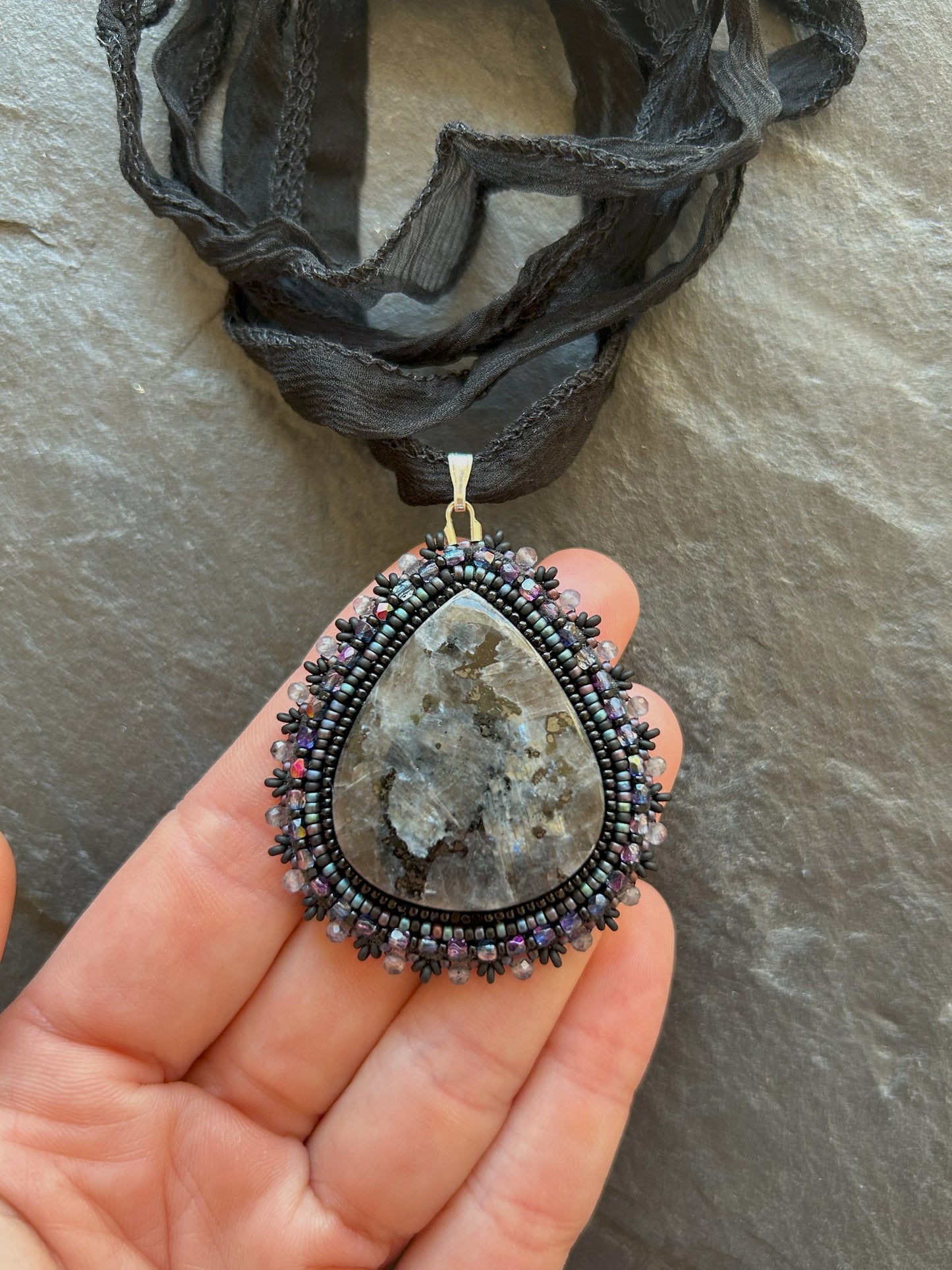 Larvikite necklace pendant with iolite beads