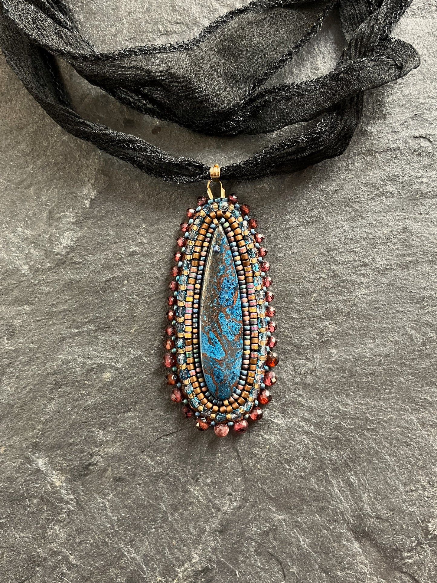Azurite necklace pendant with red garnet beads