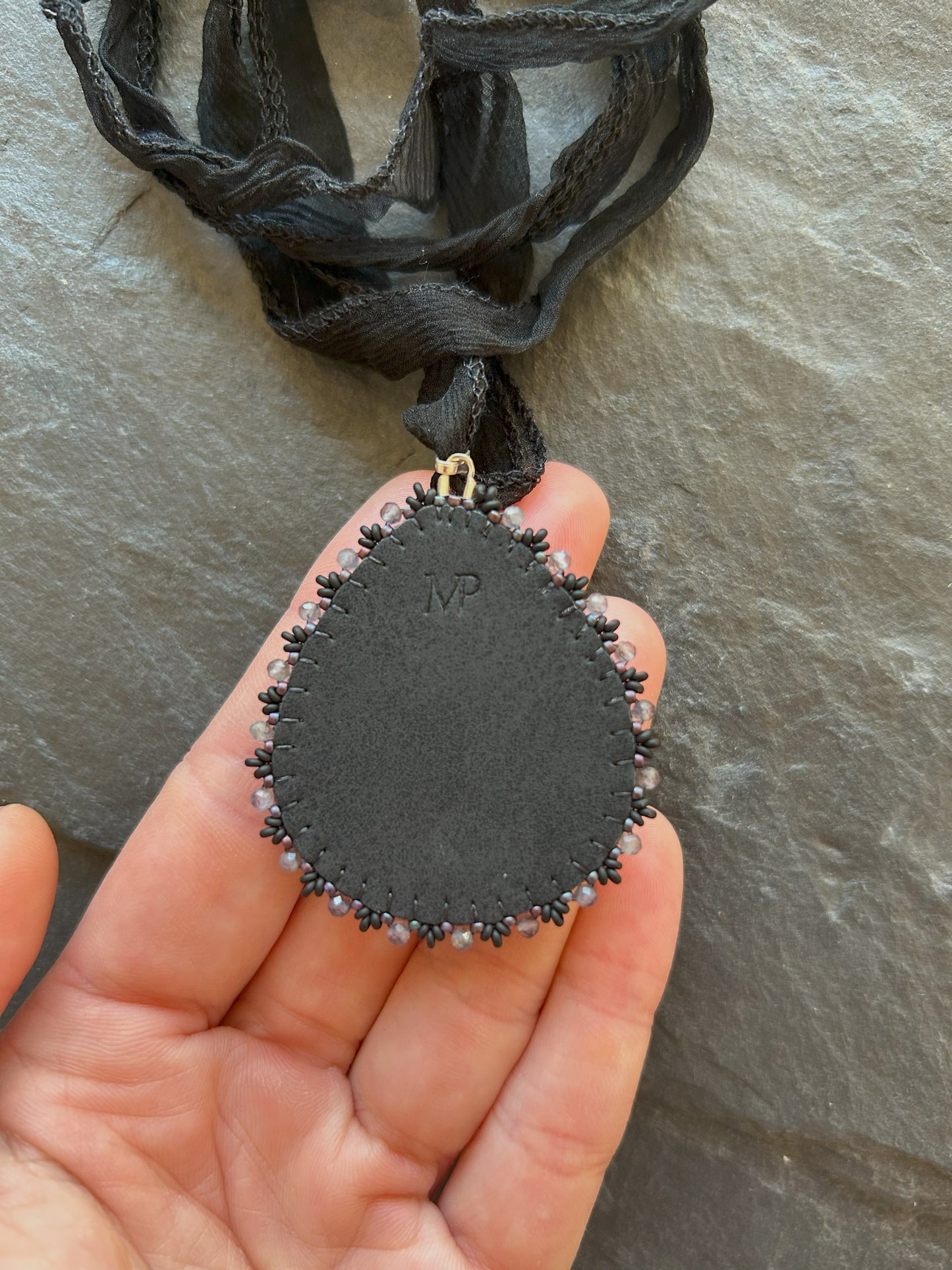 Larvikite necklace pendant with iolite beads