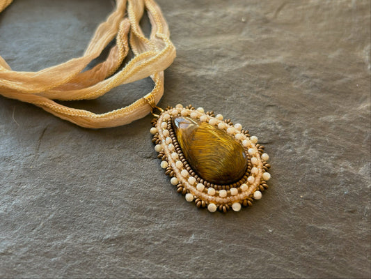 Tiger's eye necklace pendant with shell beads