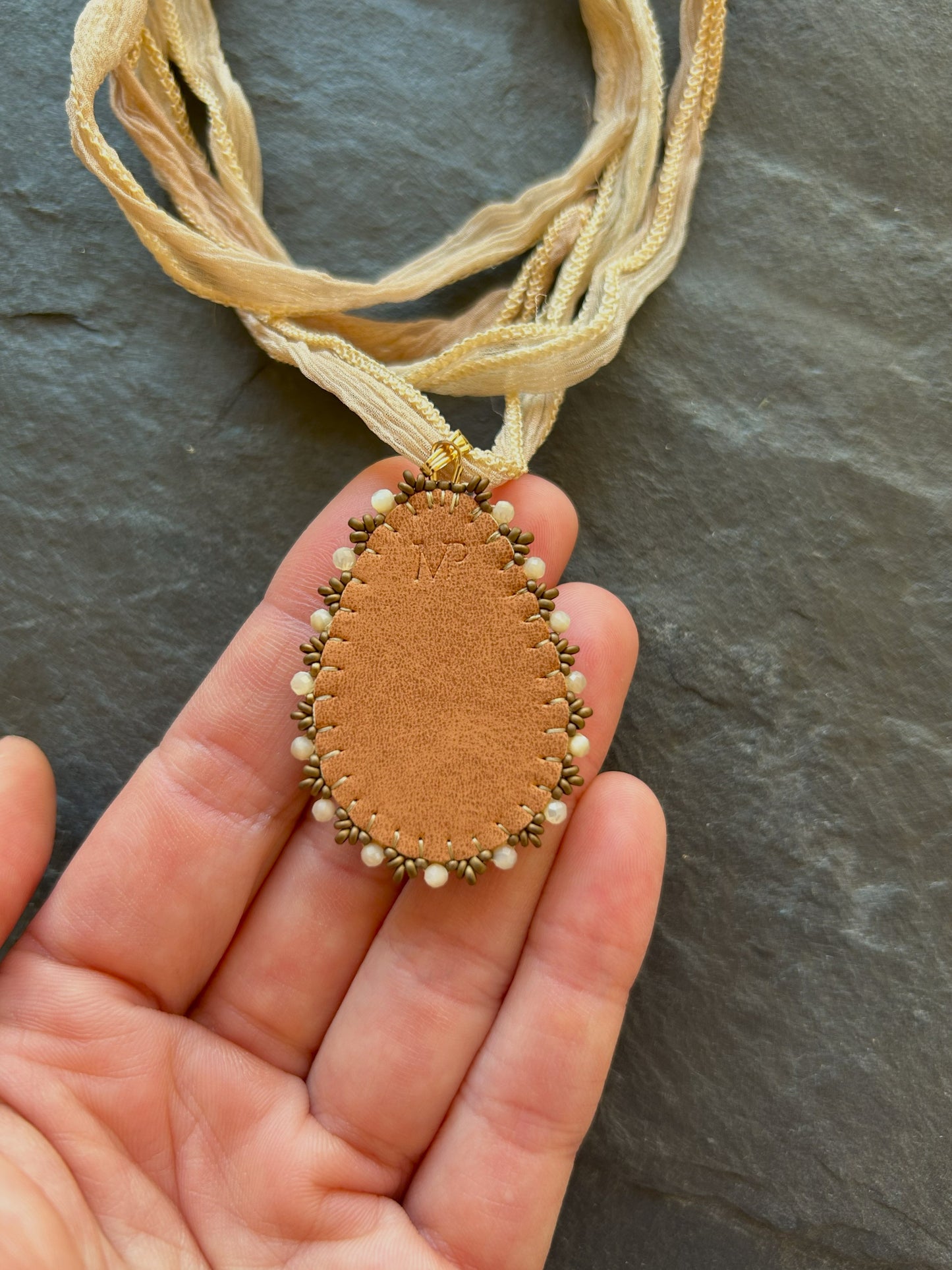 Tiger's eye necklace pendant with shell beads