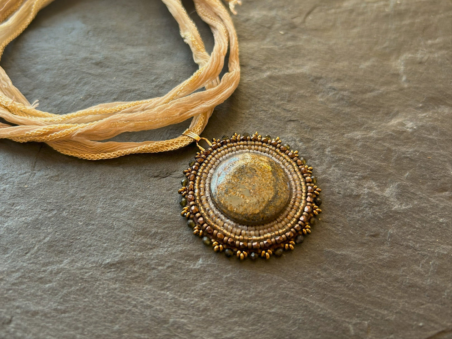 Bronzite necklace pendant with obsidian beads