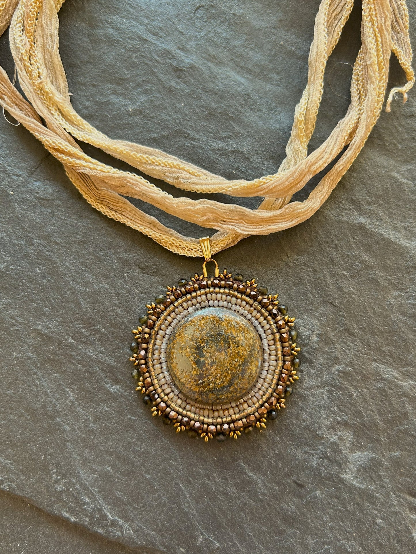 Bronzite necklace pendant with obsidian beads