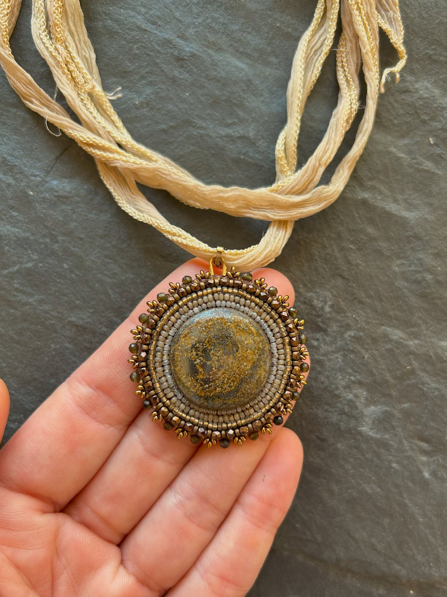 Bronzite necklace pendant with obsidian beads