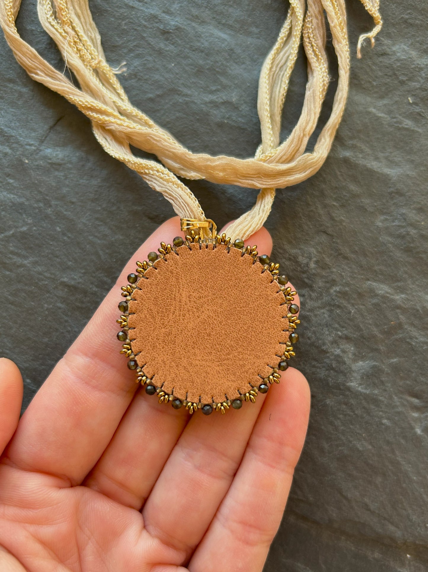 Bronzite necklace pendant with obsidian beads