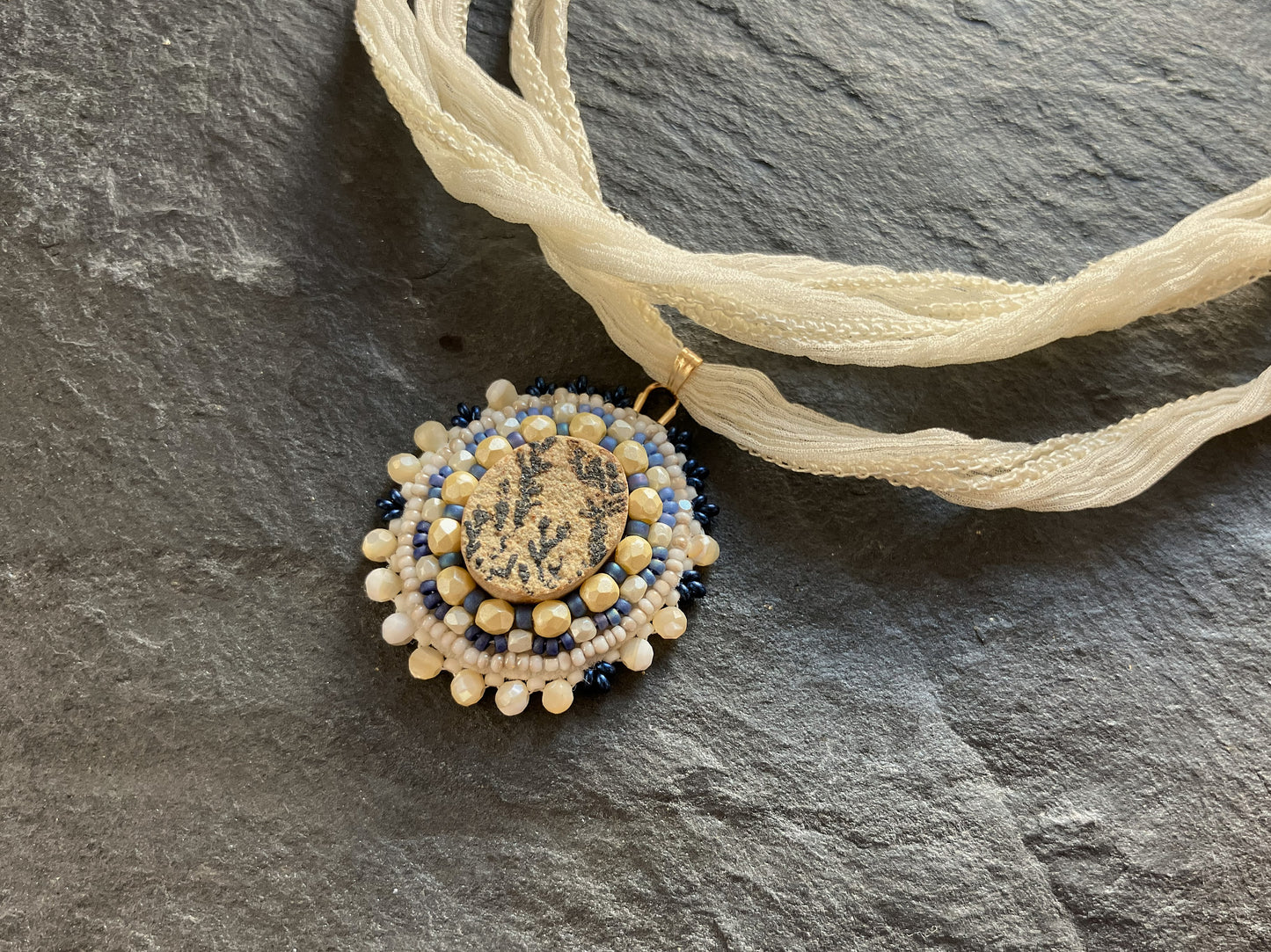 Small dendritic psilomelane necklace pendant with mother-of-pearl beads