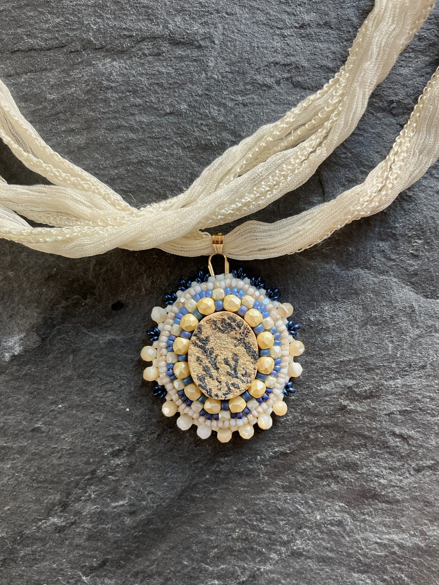 Small dendritic psilomelane necklace pendant with mother-of-pearl beads