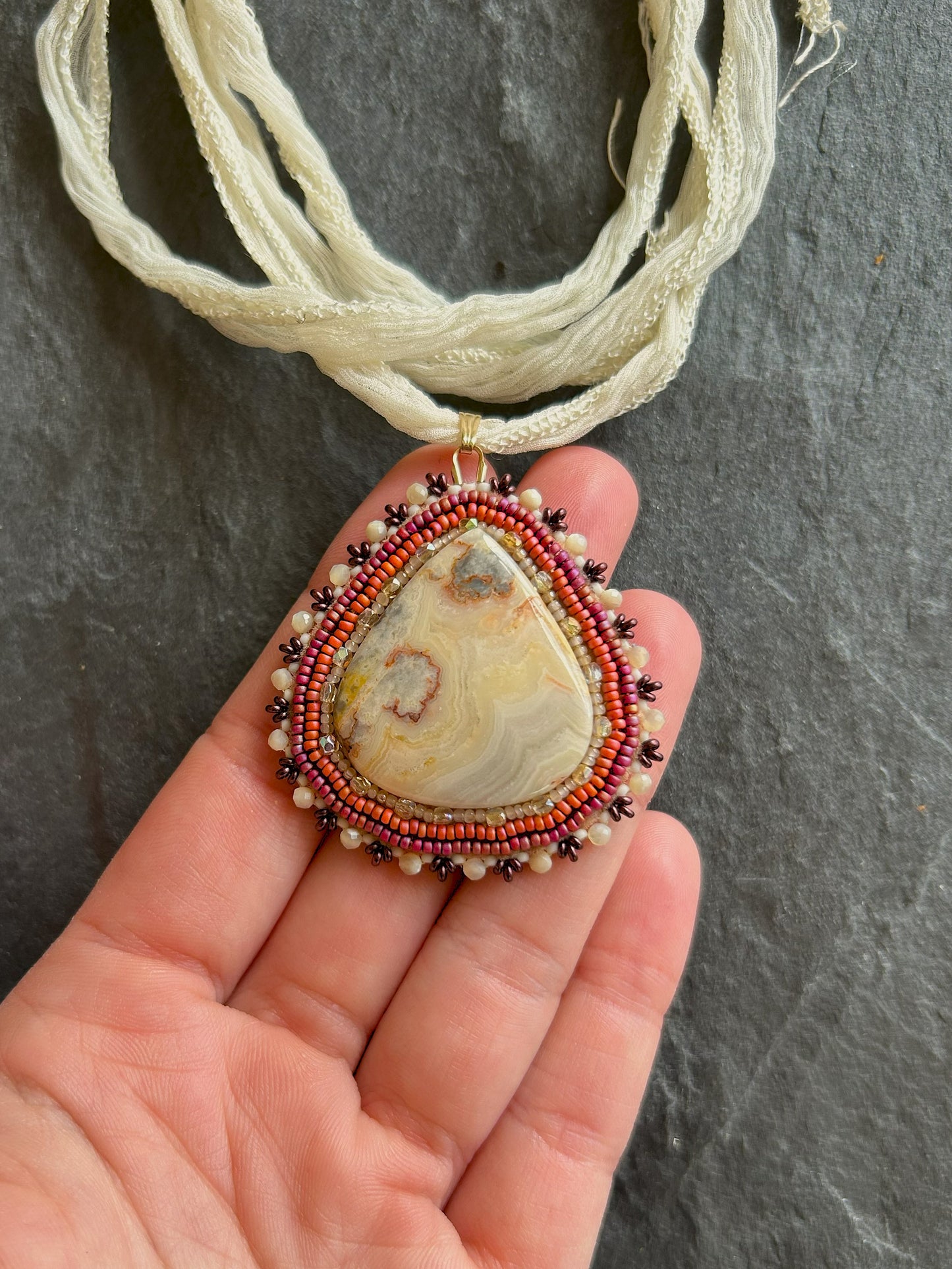 Agate necklace pendant with mother-of-pearl beads