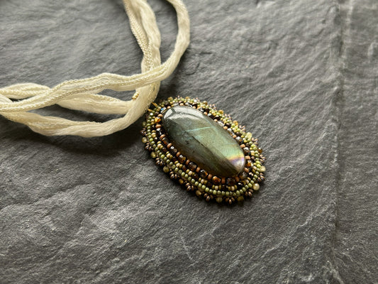 Iridescent labradorite necklace pendant in earth tones
