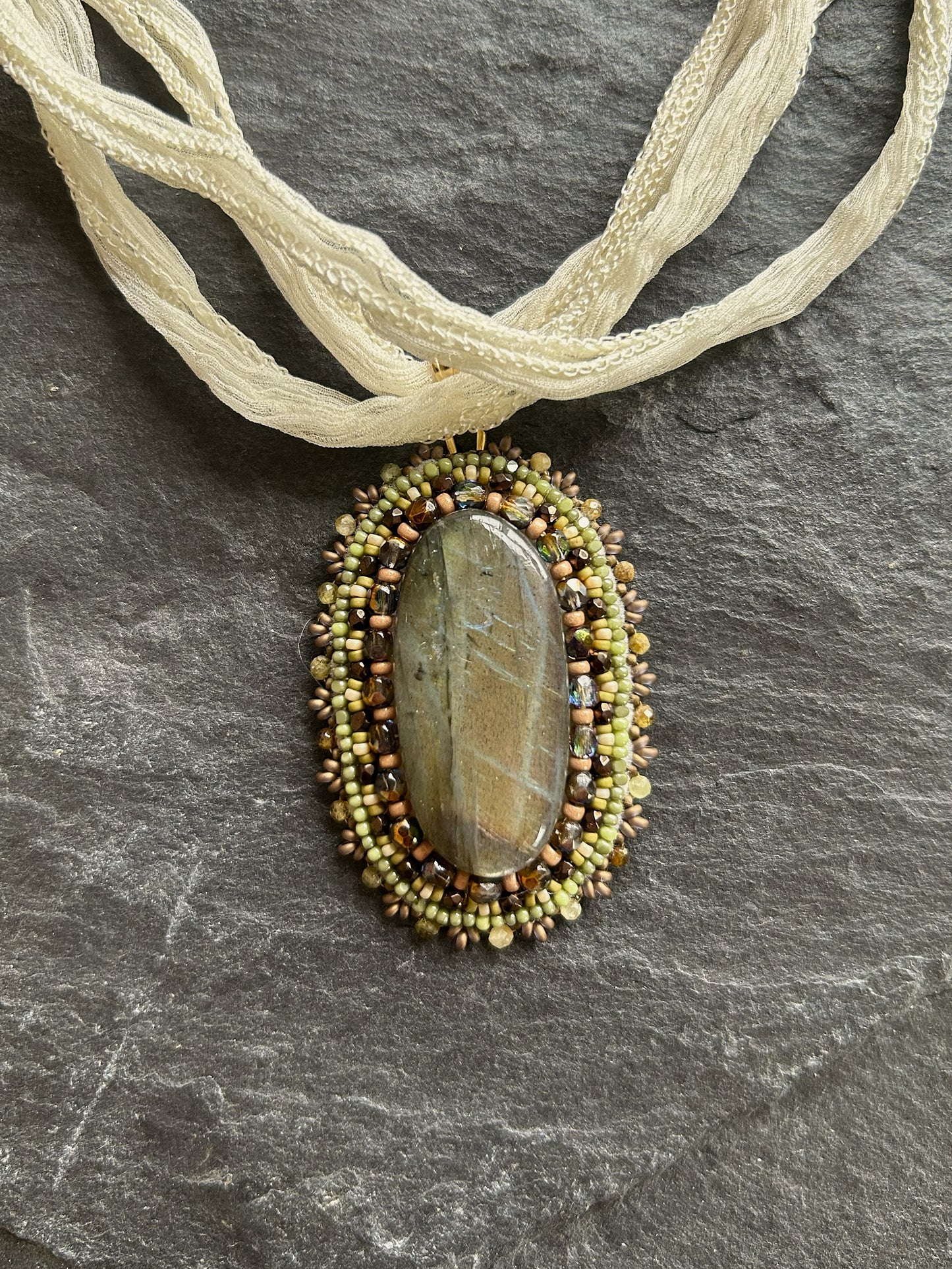 Iridescent labradorite necklace pendant in earth tones
