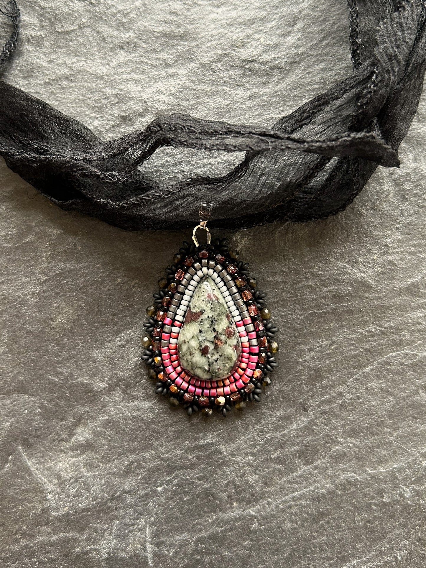 Eudialyte necklace pendant with obsidian beads