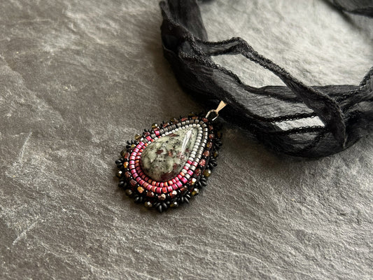 Eudialyte necklace pendant with obsidian beads