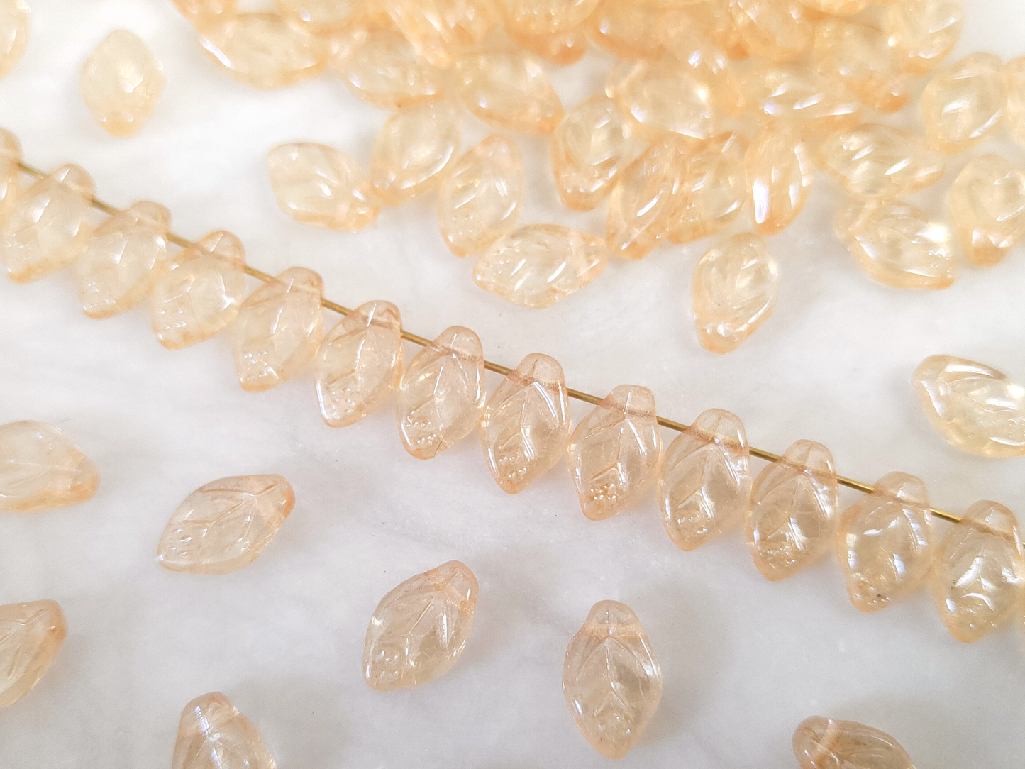 Cherry leaf beads 12mm - warm beige