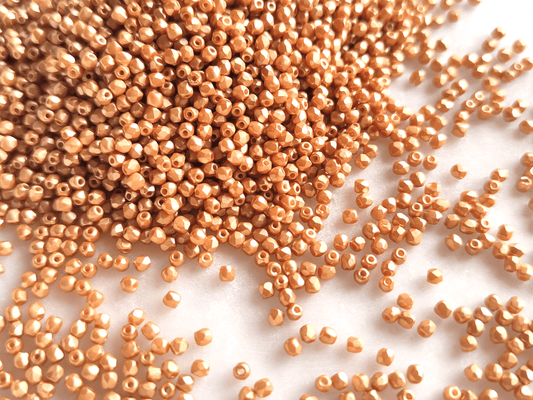 2mm fire-polished beads - pearlescent gold