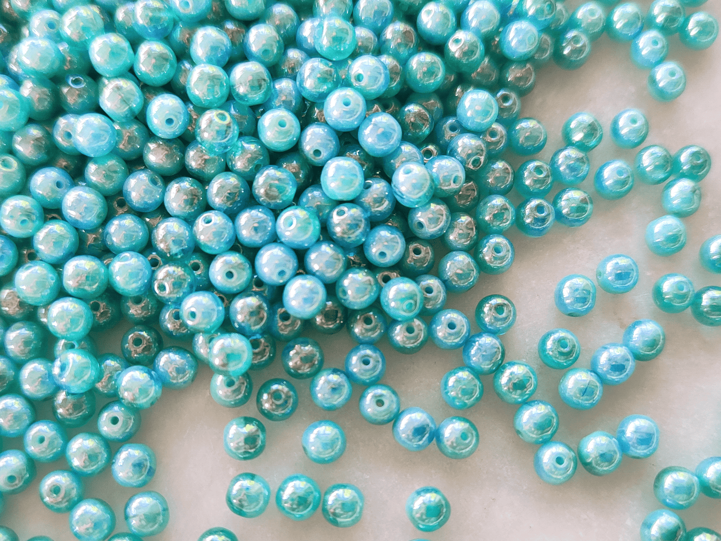 4mm round beads - turquoise luster