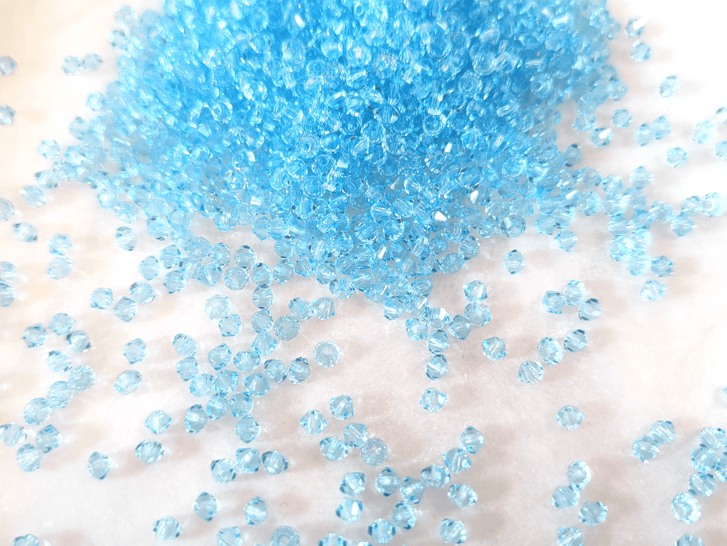 3mm MC bicone beads - warm light blue