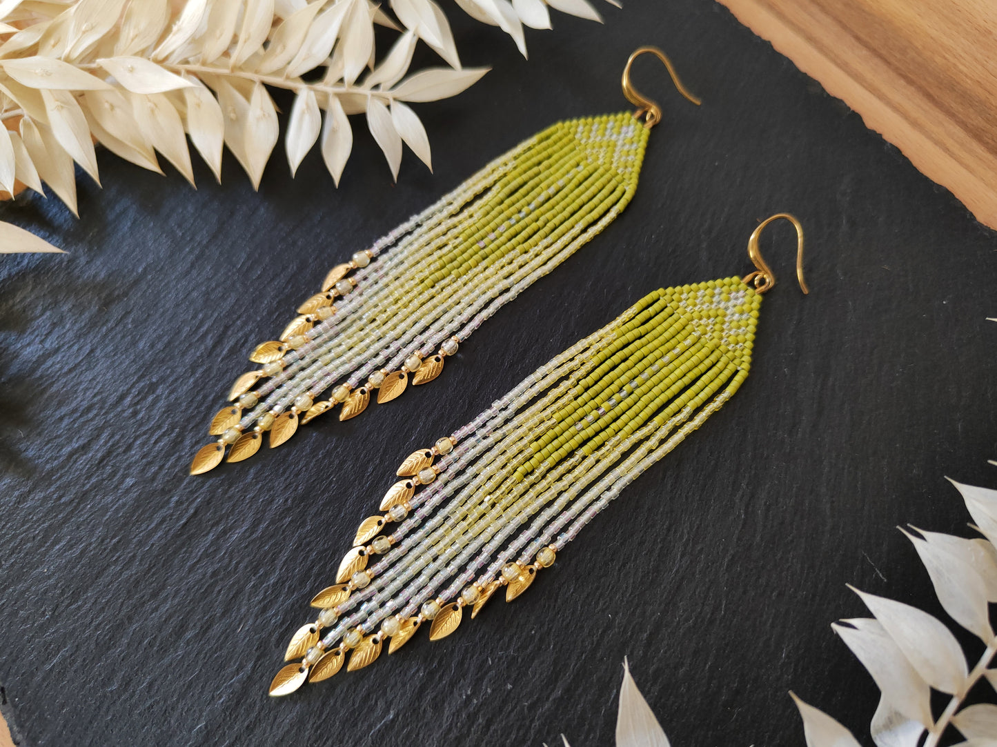 Fringe earrings "Faunus" with tribal-inspired design - green & white