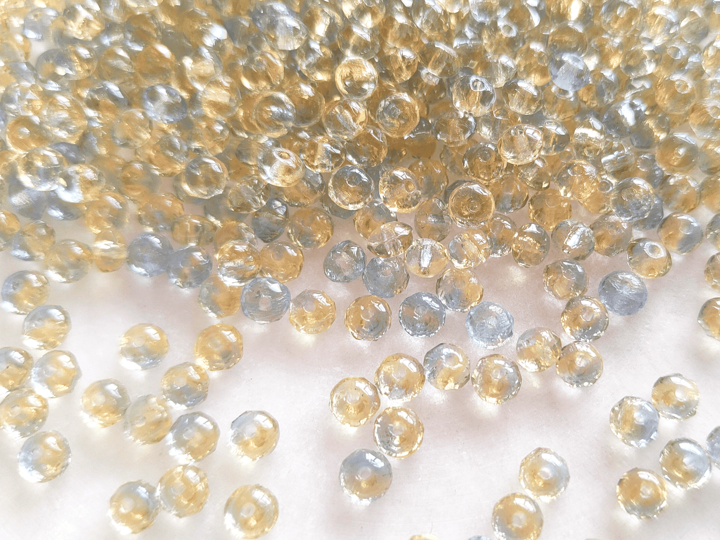 Faceted rondelle beads 3x5mm - light yellow & blue