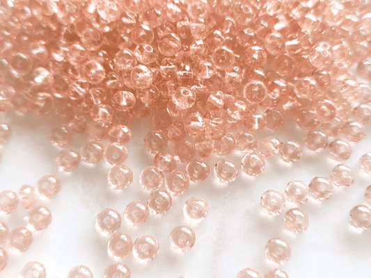 Faceted rondelle beads 3x5mm - salmon / light orange