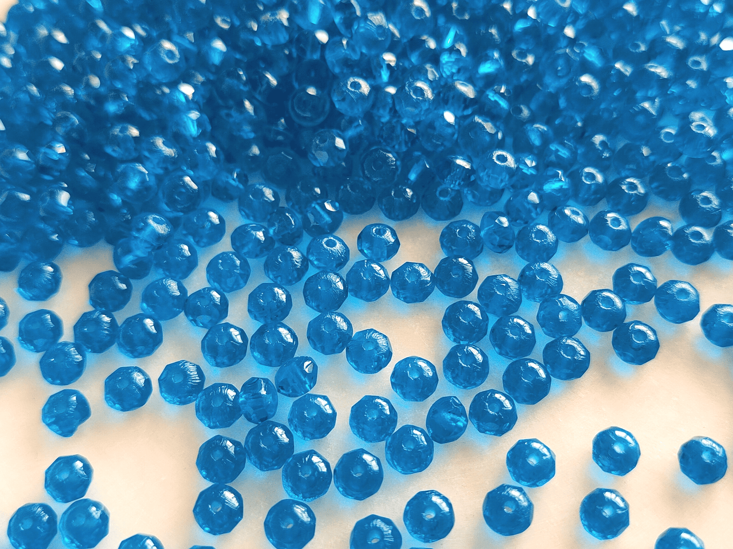 Faceted rondelle beads 3x5mm - dark Caribbean blue