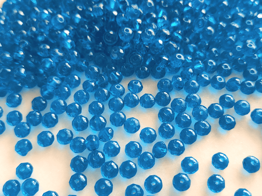 Faceted rondelle beads 3x5mm - dark Caribbean blue