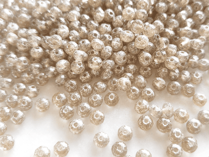 Faceted rondelle beads 3x5mm - cream & silver