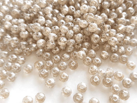 Faceted rondelle beads 3x5mm - cream & silver