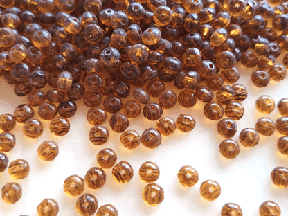 Facettierte Rondelle 3x5mm - Orange & gebändert
