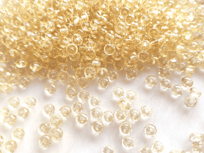 Faceted rondelle beads 3x5mm - light yellow
